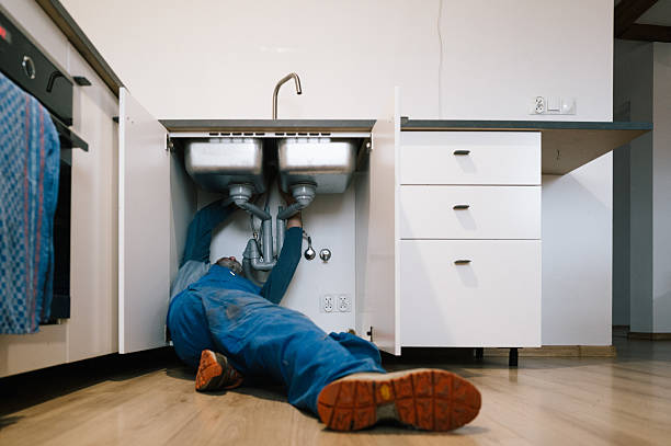 Professional Emergency Plumber technician working in Cocolalla, ID